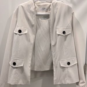 White blazer with matching white top. From Vanity Fair